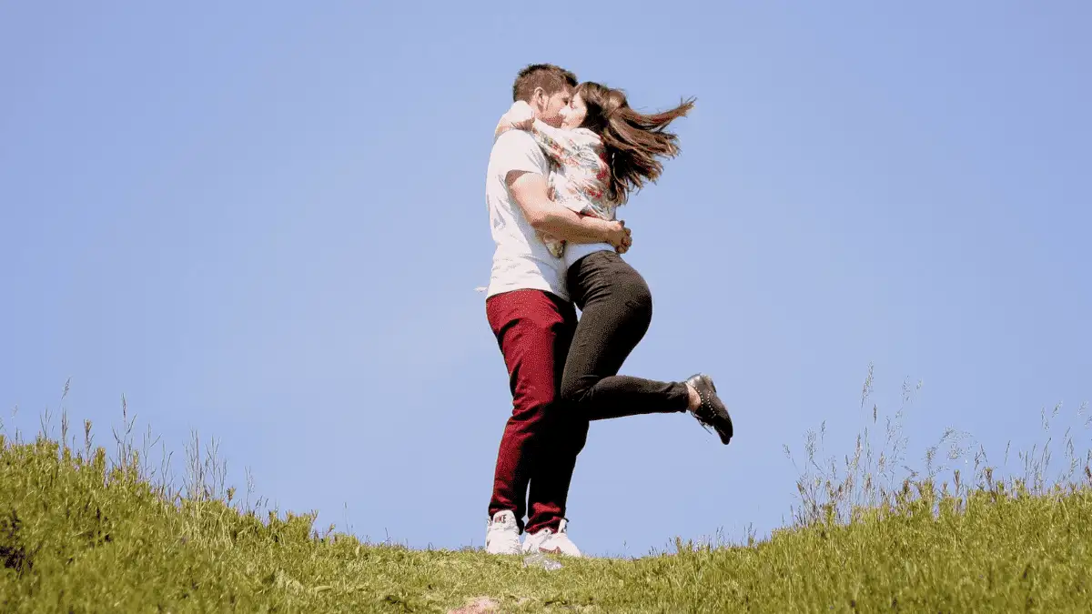 A girl hugging a guy to show how a boy should treat a girl