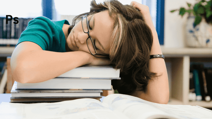 A student studying and sleeping