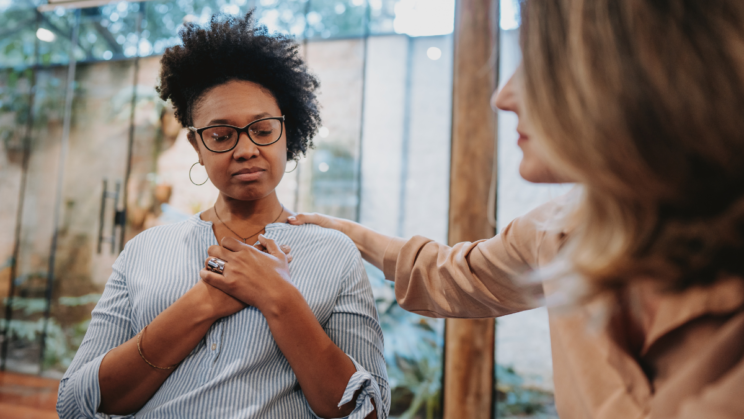 A woman trying to deal with difficult emotion