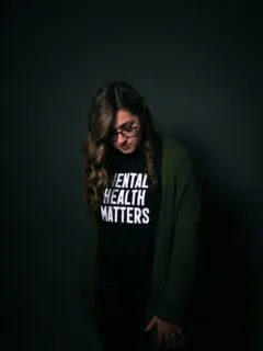 woman in black and white long sleeve shirt