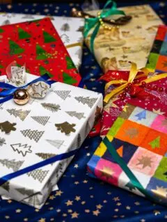 a group of wrapped presents sitting on top of a table