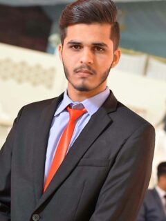 man wearing black suit jacket
