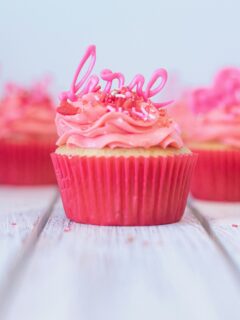 pink cupcake with pink icing on top