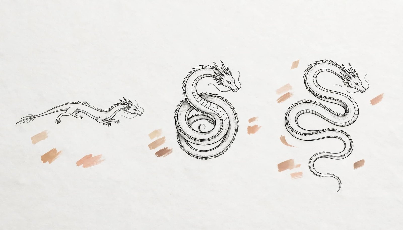 Three small black ink dragon tattoo designs arranged on white sketch paper.