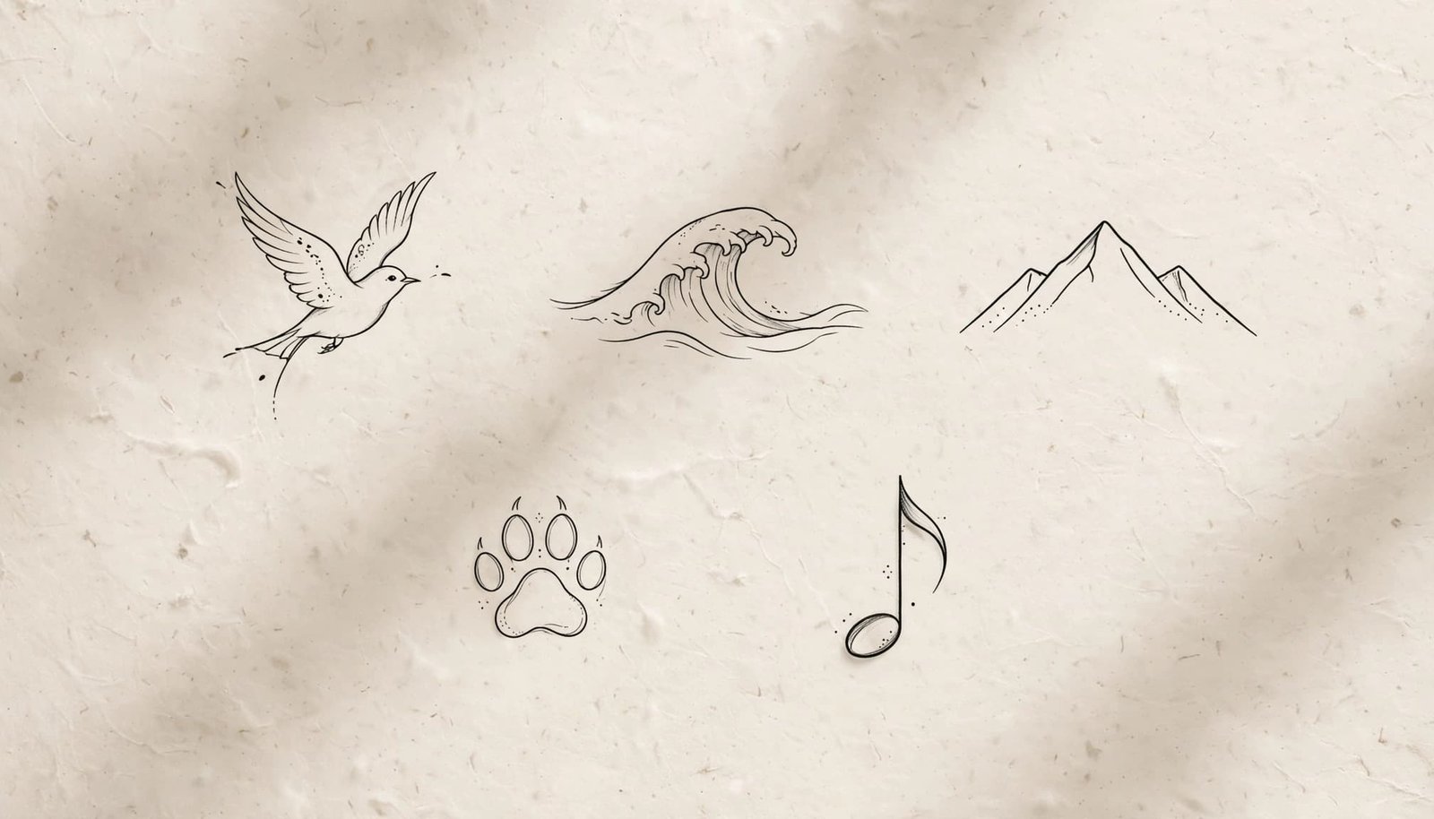 Five fine-line tattoo motifs on warm ivory paper: bird, wave, mountain, paw print, and music note.